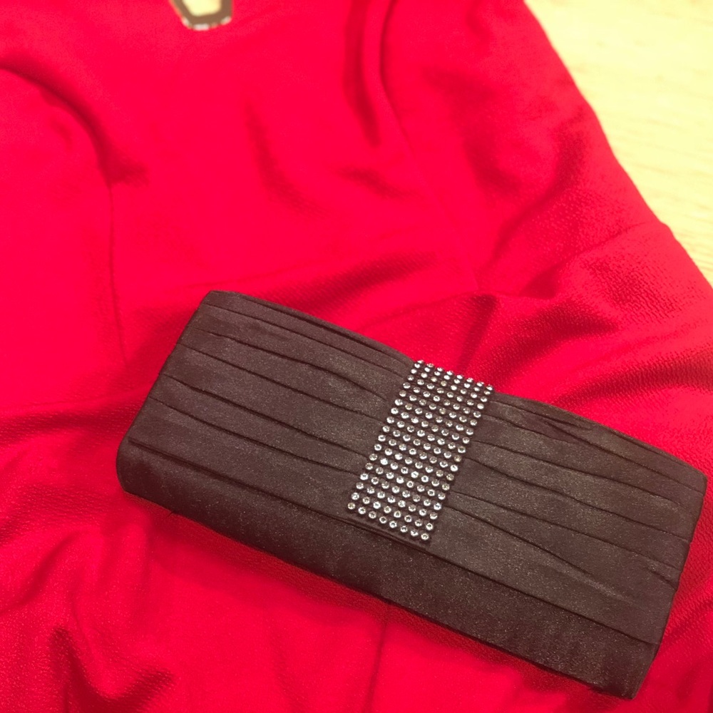 Satin clutch with rhinestone detail